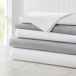 Crisp folded cotton bed sheets